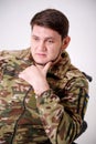 History of Ukraine Adult handsome man 35 years old Military man in uniform sitting and smoking He has rings on his