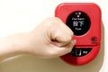 Hit fire alarm button Royalty Free Stock Photo