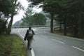 Hitch hiking woman Royalty Free Stock Photo