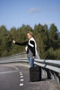 Hitchhiking woman