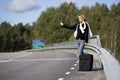 Hitchhiking woman