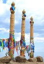 Hitching posts with ribbons of shamanism religion in Khuzhir, island Olkhon.