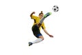 Hitting ball in a jump. Young professional female football, soccer player in motion, training, playing isolated over