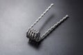 Hive coil for vaping on a black background Royalty Free Stock Photo