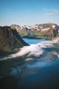 Hjorundfjord landscape in Norway mountains aerial clouds view travel Sunnmore Alps beautiful destinations