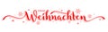 FROHE WEIHNACHTEN red calligraphy banner which means MERRY CHRISTMAS in German Royalty Free Stock Photo