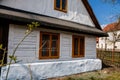 Hlinsko, Vysocina, Czech Republic, 15 April 2022: Traditional village wooden farm house at summer sunny day, historic country-