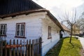 Hlinsko, Vysocina, Czech Republic, 15 April 2022: Traditional village wooden farm house at summer sunny day, historic country-