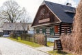 Hlinsko, Vysocina, Czech Republic, 15 April 2022: Traditional village wooden farm house at summer sunny day, historic country-