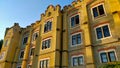 Medieval style looking hotel beautifully illuminated by sunlight