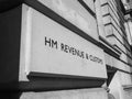 HM Revenue and Customs sign in London, black and white