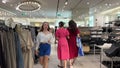 HM store Ho Chi Minh City Vietnam 02.08.2024 center mall shopping people walking choosing clothes women's department