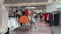 HM store Ho Chi Minh City Vietnam 02.08.2024 center mall shopping people walking choosing clothes women's department