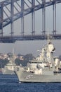 HMAS Perth FFH 157 Anzac-class frigate of the Royal Australian Navy sailing under the iconic Sydney Harbor Bridge