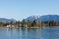 HMCS Discovery military base on a Deadman Island in Vancouver Stanley Park with mountains in the background