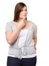 Hmmm...A full-figured young woman looking away thoughtfully while isolated on white.