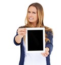 Hmmm, not sure about this profile pic...Studio shot of a young woman holding a digital tablet.