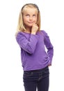 Hmmmm, what shall I be when I grow up. Sweet little blonde girl posing thoughtfully against a white background.