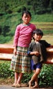 Hmong children standing on rural road in Daklak, Vietnam