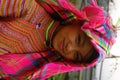 Hmong flower girl returning from the fields