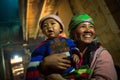 Hmong hill tribe woman poses for portrait with son Royalty Free Stock Photo