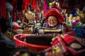 Hmong hill tribe woman uses sewing machine