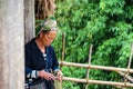 A Hmong lady making a bracelet, Sapa, Vietnam