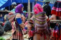 Hmong tribe woman carrying her child, Bac Ha, Vietnam Royalty Free Stock Photo