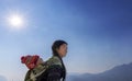 Hmong tribe woman carrying her child at her back in Sapa, Vietnam Royalty Free Stock Photo