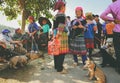 Hmong women selling dogs in Bac Ha market
