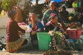 Hmong women selling vetgetable in Bac Ha market Royalty Free Stock Photo