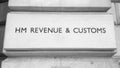 HMRC sign in London, black and white