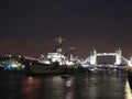 HMS Belfast and Tower bridge at night