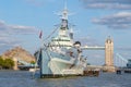 The HMS Belfast warship docked near Tower Bridge on the river Thames Royalty Free Stock Photo