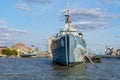 The HMS Belfast warship docked near Tower Bridge on the river Thames