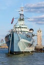 The HMS Belfast warship docked near Tower Bridge on the river Thames Royalty Free Stock Photo