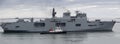 HMS Ocean returning to Plymouth with tug boat