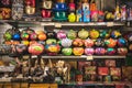 Ho Chi Minh City: abundance of souvenirs caskets, statuettes, cups, etc on shelves in a shop in Ben Thanh Market Royalty Free Stock Photo