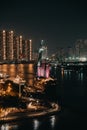 Ho Chi Minh city at night, Elisa Sailboat, a floating restaurant, Far away is landmark 81 skyscraper and Thu Thiem peninsula Royalty Free Stock Photo