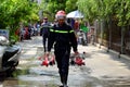 Vietnamese firefighter finish fire fighting training and leave the scene