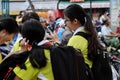 School girl stand with i phone, focus on smartphone after school