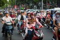 Ho Chi Minh city, Vietnam - April 19, 2015 : crowed scene of city traffic in rush hour, crowd of people wear helmet, transport by