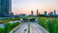 Busy traffic in Thu Thiem tunnel exit in late sunset afternoon