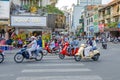 Typical intersection of Vietnamese streets with a lot of mopeds