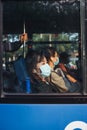 HO CHI MINH CITY,VIETNAM - DEC 10: People wearing mouth mask against air smog pollution PM 2.5 and Coronavirus on bus public