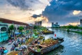 Flowers boat at flower market along canal wharf