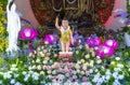 Statue Buddha`s birthday in Temple are ecorated lights, colorful flowers