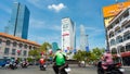 Ho Chi Minh City, Vietnam: motorbike traffic blurred in motion in a street of Saigon downtown