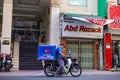 Ho Chi Minh City, Vietnam - November 10, 2022: Lazada delivery service in the streets of Saigon. Delivery motorbike rider send Royalty Free Stock Photo