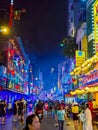 Ho Chi Minh City, Vietnam - A crowd of people move along Bui Vien Street , a popular nightlife district lined with